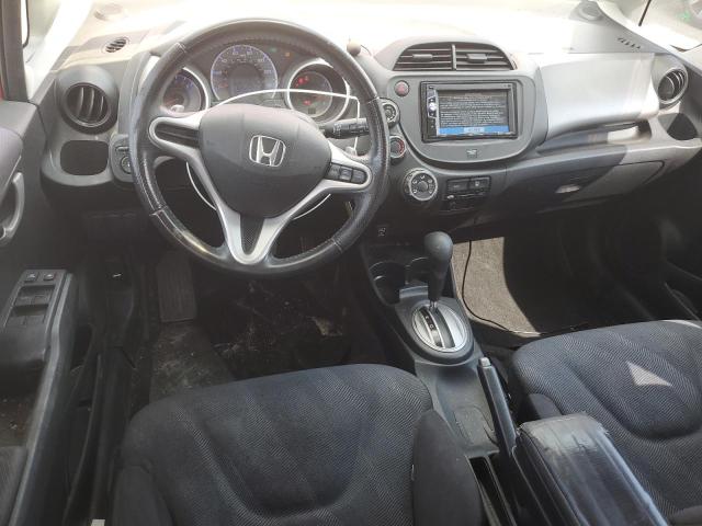 JHMGE8H40AC040695 - 2010 HONDA FIT SPORT RED photo 8