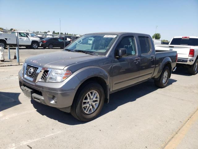 1N6ED0FB7LN718863 - 2020 NISSAN FRONTIER SV TAN photo 1