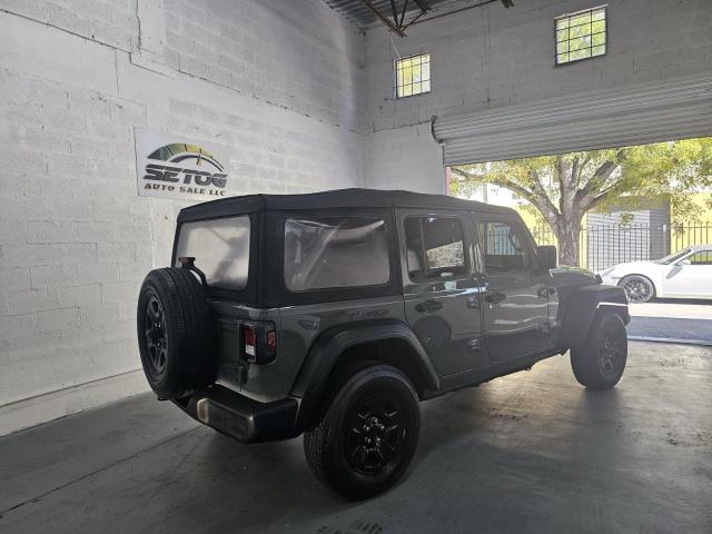 1C4HJXDN3JW261295 - 2018 JEEP WRANGLER U SPORT Сұр фото 4