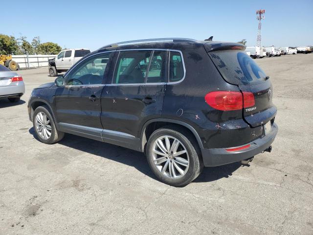 WVGAV3AX5EW550118 - 2014 VOLKSWAGEN TIGUAN S BLACK photo 2