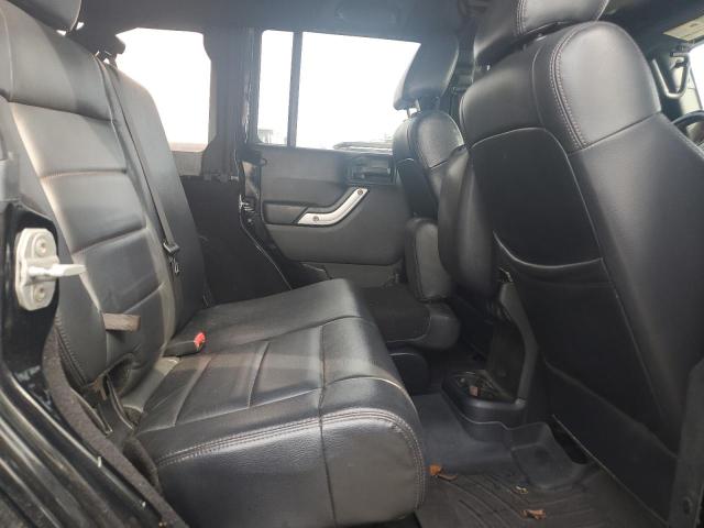 1C4BJWEG2CL209421 - 2012 JEEP WRANGLER UNLIMITED SAHARA შავი ფოტო 11