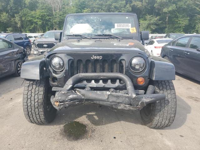 1C4BJWEG2CL209421 - 2012 JEEP WRANGLER UNLIMITED SAHARA შავი ფოტო 5