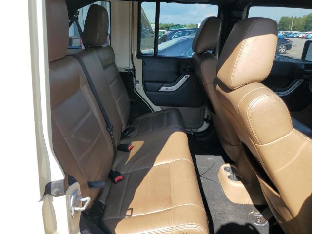 1J4BA5H19BL572017 - 2011 JEEP WRANGLER U SAHARA Braun Foto 11