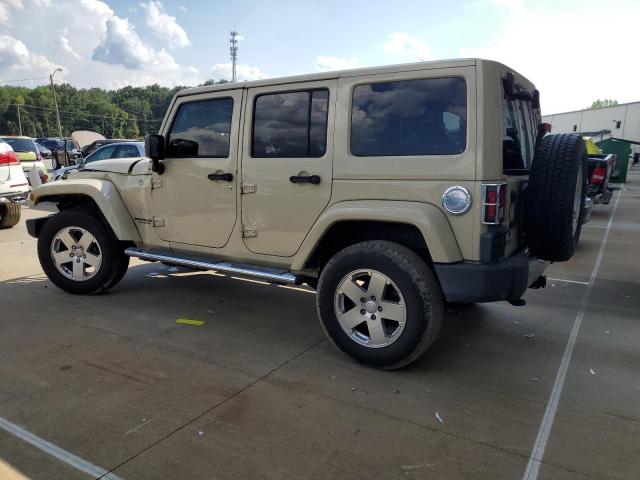 1J4BA5H19BL572017 - 2011 JEEP WRANGLER U SAHARA Braun Foto 2