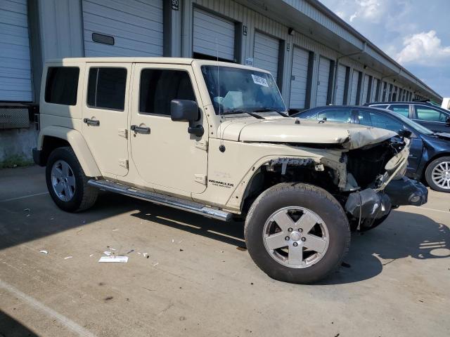 1J4BA5H19BL572017 - 2011 JEEP WRANGLER U SAHARA Braun Foto 4
