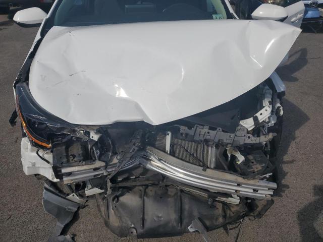 5YFEPRAE6LP007450 - 2020 TOYOTA COROLLA LE Weiß Foto 11