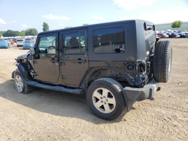 1J4BA5H17BL521020 - 2011 JEEP WRANGLER U SAHARA Qara foto 2