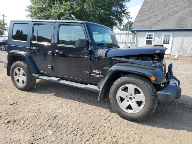 1J4BA5H17BL521020 - 2011 JEEP WRANGLER U SAHARA Qara foto 4