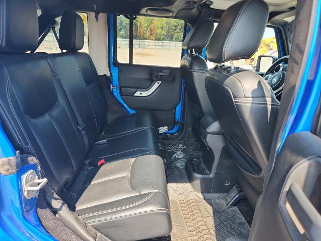 1C4BJWEG3EL198710 - 2014 JEEP WRANGLER U SAHARA BLUE photo 10