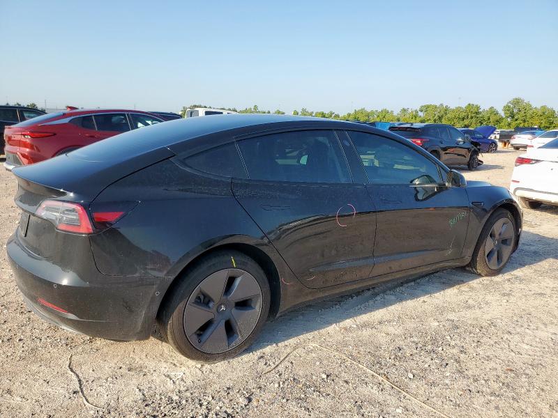 5YJ3E1EA4MF991118 - 2021 TESLA MODEL 3 Schwarz Foto 3