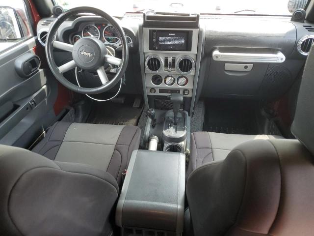 1J4HA5H14AL197047 - 2010 JEEP WRANGLER U SAHARA BURGUNDY photo 8