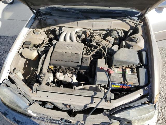 JT2GK12E9S0111987 - 1995 TOYOTA CAMRY LE TAN photo 11