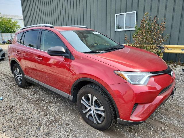 JTMBFREV4GJ084697 - 2016 TOYOTA RAV4 LE RED photo 4