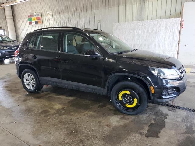 WVGAV7AX7HK017223 - 2017 VOLKSWAGEN TIGUAN S BLACK photo 4