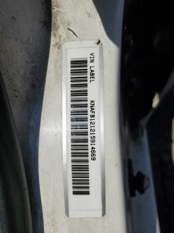 KNAFB121215914669 - 2001 KIA SEPHIA BASE WHITE photo 12