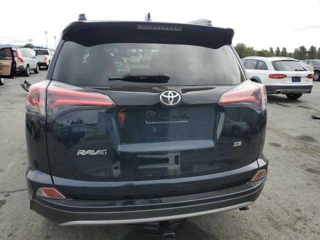 JTMNFREV3HD103351 - 2017 TOYOTA RAV4 SE BLACK photo 6