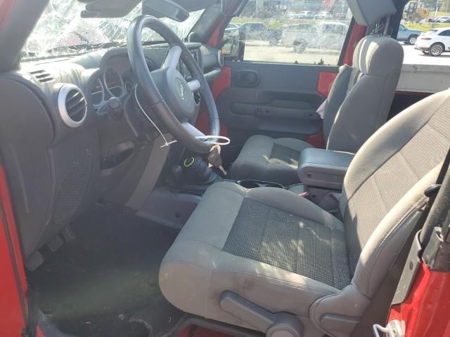 1J4GA5D15AL233250 - 2010 JEEP WRANGLER SAHARA Rojo foto 7