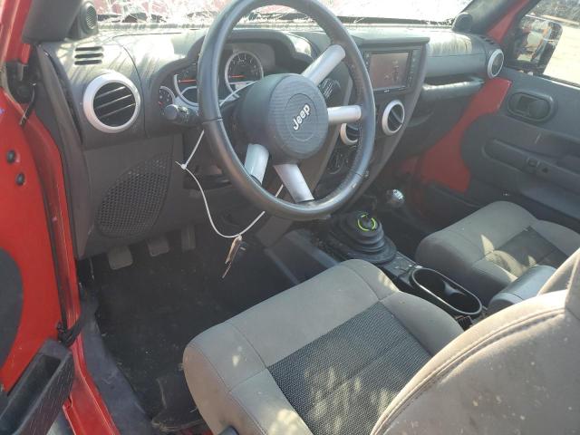 1J4GA5D15AL233250 - 2010 JEEP WRANGLER SAHARA Rojo foto 8