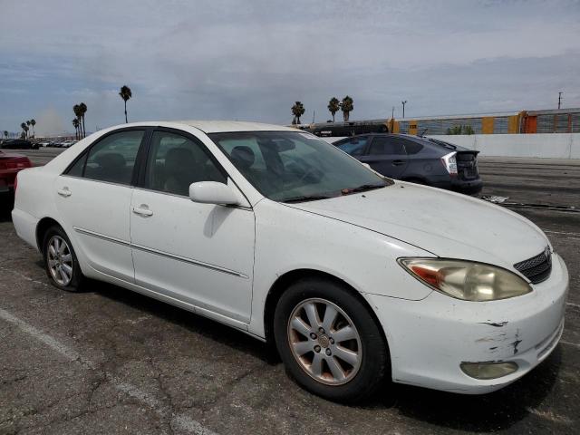 JTDBE32K830234238 - 2003 TOYOTA CAMRY LE WHITE photo 4