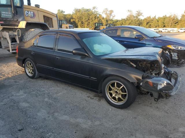2HGEJ6618YH510899 - 2000 HONDA CIVIC BASE BLACK photo 4