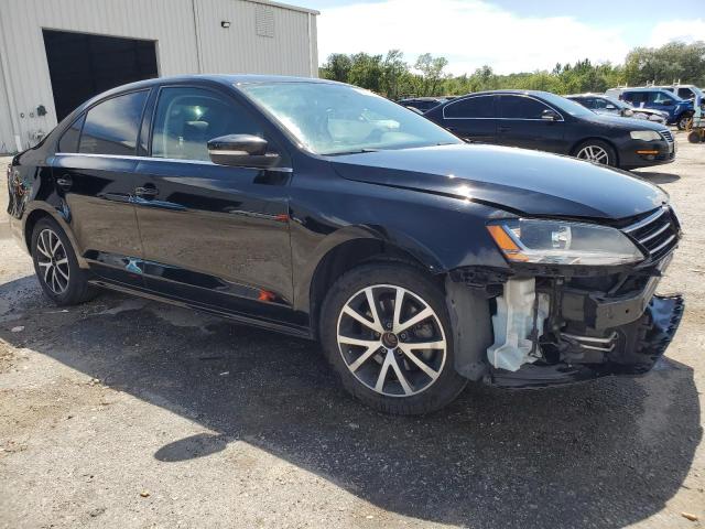 3VWDB7AJ4HM400547 - 2017 VOLKSWAGEN JETTA SE BLACK photo 4