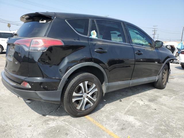 2T3ZFREV2HW402527 - 2017 TOYOTA RAV4 LE შავი ფოტო 3