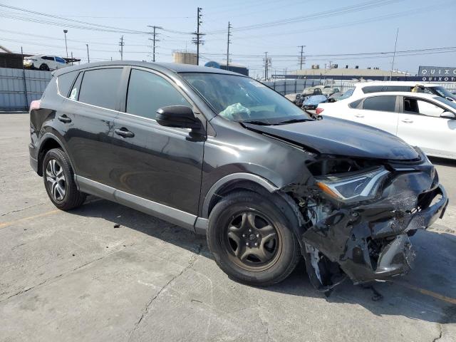 2T3ZFREV2HW402527 - 2017 TOYOTA RAV4 LE შავი ფოტო 4