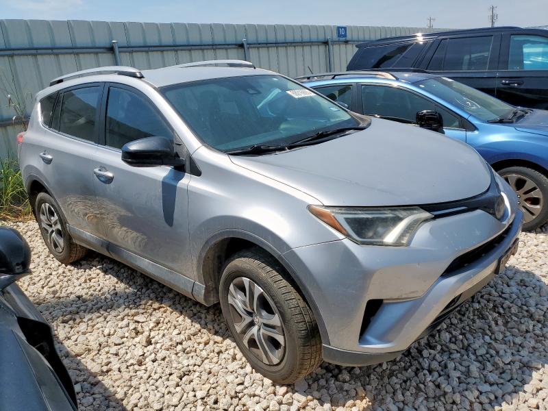 2T3ZFREV1HW316318 - 2017 TOYOTA RAV4 LE SILVER photo 4
