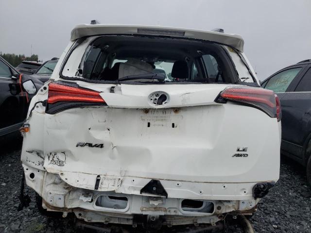 2T3BFREVXJW822060 - 2018 TOYOTA RAV4 LE WHITE photo 6