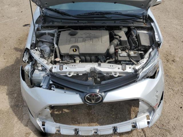 2T1BURHE9KC169458 - 2019 TOYOTA COROLLA L Silber Foto 11
