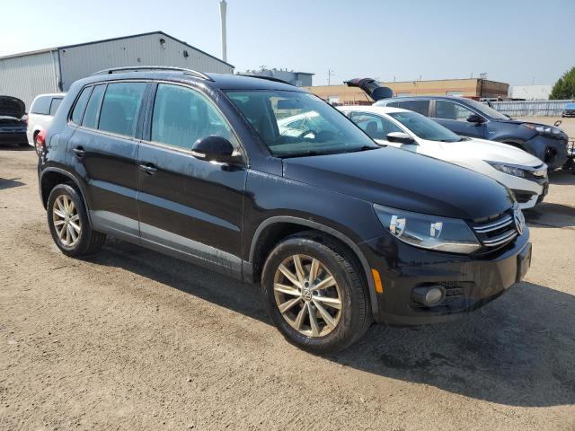 WVGJV7AX2DW523674 - 2013 VOLKSWAGEN TIGUAN S BLACK photo 4
