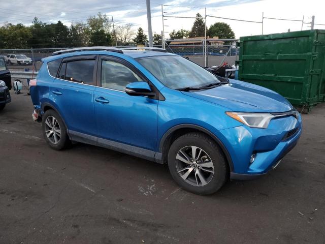 JTMRFREV4JJ199287 - 2018 TOYOTA RAV4 ADVENTURE BLUE photo 4