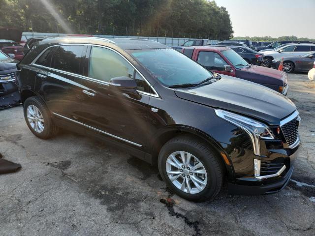 1GYKNAR48PZ148094 - 2023 CADILLAC XT5 LUXURY BLACK photo 4