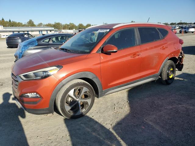 KM8J33A24HU349823 - 2017 HYUNDAI TUCSON LIMITED ORANGE photo 1