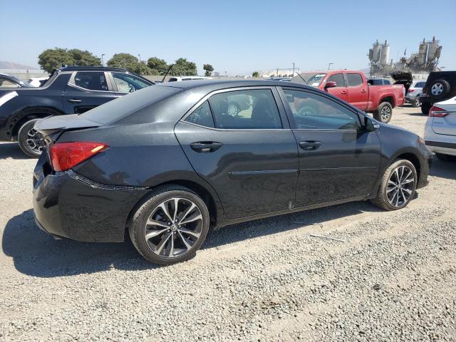 5YFBURHE4JP816878 - 2018 TOYOTA COROLLA L BLACK photo 3