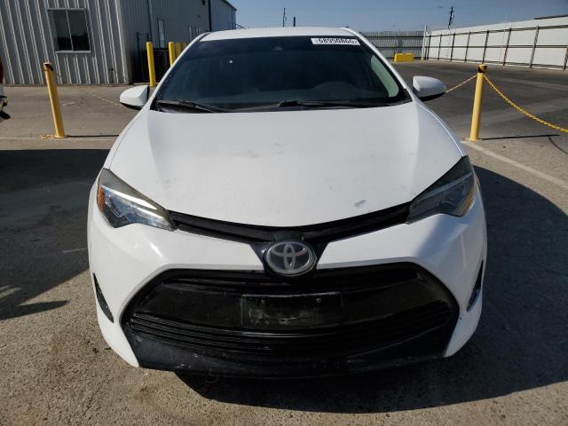 5YFBURHEXHP667788 - 2017 TOYOTA COROLLA L თეთრი ფოტო 5