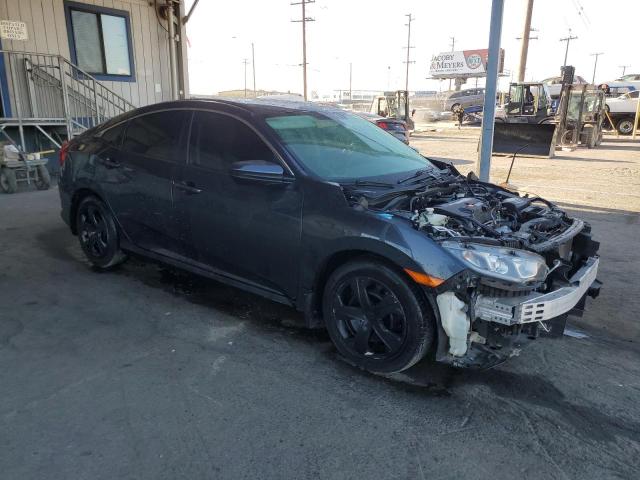 2HGFC2F54JH573093 - 2018 HONDA CIVIC LX შავი ფოტო 4