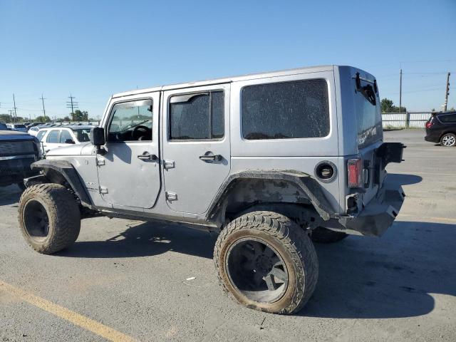 1C4BJWEG3GL145928 - 2016 JEEP WRANGLER U SAHARA SILVER photo 2