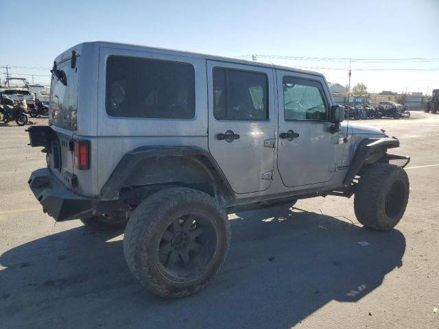 1C4BJWEG3GL145928 - 2016 JEEP WRANGLER U SAHARA SILVER photo 3