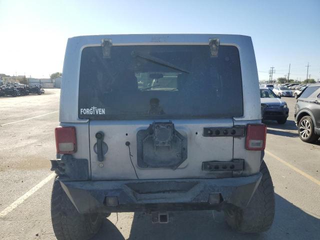 1C4BJWEG3GL145928 - 2016 JEEP WRANGLER U SAHARA SILVER photo 6