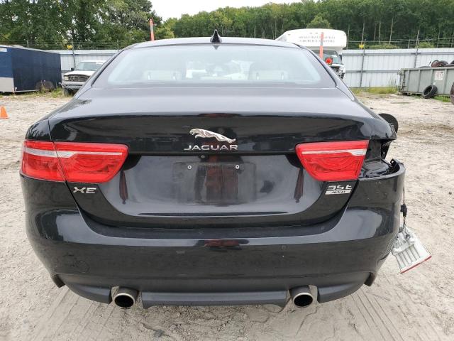 SAJAK4EVXJCP24211 - 2018 JAGUAR XE PRESTIGE BLACK photo 6