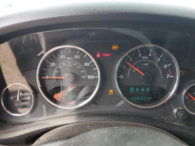 1C4BJWEG7EL302485 - 2014 JEEP WRANGLER U SAHARA GOLD photo 9