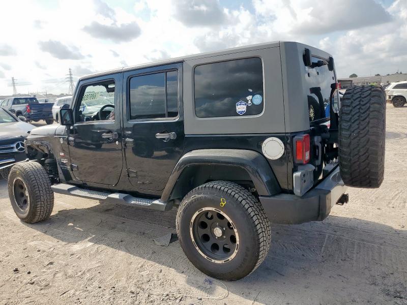 1J8GA59128L594064 - 2008 JEEP WRANGLER U SAHARA BLACK photo 2