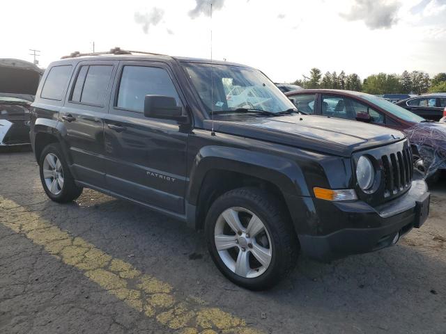 1C4NJRCB6DD248241 - 2013 JEEP PATRIOT LIMITED BLACK photo 4