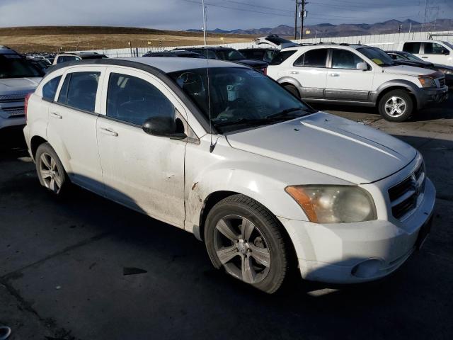 1B3CB3HA0AD597975 - 2010 DODGE CALIBER MAINSTREET WHITE photo 4