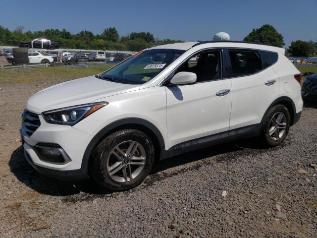 5NMZUDLB2HH031312 - 2017 HYUNDAI SANTA FE S WHITE photo 1