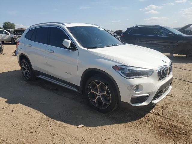 WBXHT3C31G5E49692 - 2016 BMW X1 XDRIVE28I WHITE photo 4