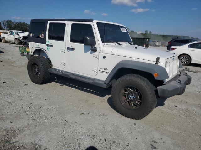1C4BJWDG6FL652547 - 2015 JEEP WRANGLER U SPORT WHITE photo 4