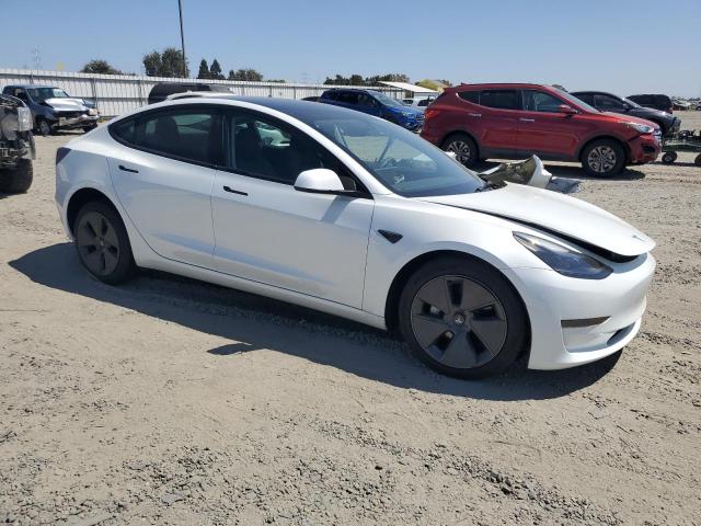 5YJ3E1EA8PF612075 - 2023 TESLA MODEL 3 WHITE photo 4