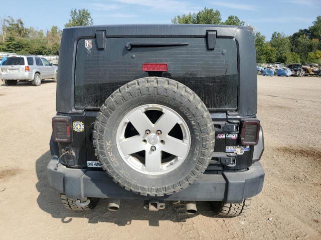 1C4AJWBG8DL593075 - 2013 JEEP WRANGLER SAHARA BLACK photo 11